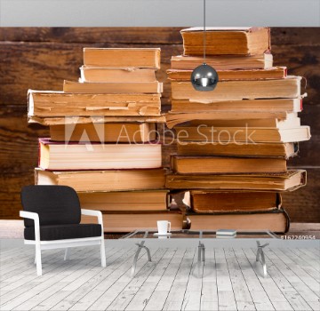 Picture of old books on a wooden shelf